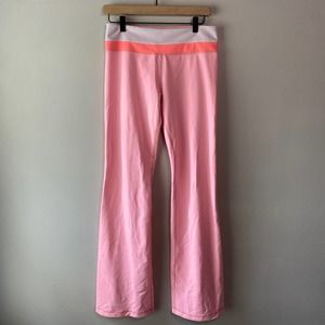 Lululemon Women's Groove Flare Leggings, Coral Pink, Size 8